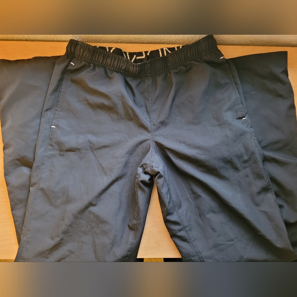 Under Armour track pants, small